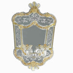 Load image into Gallery viewer, specchio veneziano classico con lampade ed elementi decorativi in vetro di murano a forma di canne, ricci, foglie e fiori di colore cristallo su fondo oro, lastra centrale specchiata
